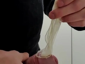 Play with used cumfilled condom from stranger