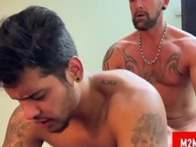 Hot muscle daddy fucking a young dude