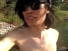 Jon arteen is this slim asian twink boy dancing a musical strip-tease on the river smiling showing his full pubes doing outdoor gay porn with a sneaker and underwear fetish