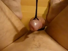 Pulling the strings to let this cock cum
