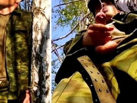 Russian soldier with a big dick on a military mission in the forest shoots sperm from his penis at opponents