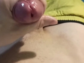 The guy jerks off with moans and cums