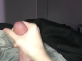 Young boy strokes cock