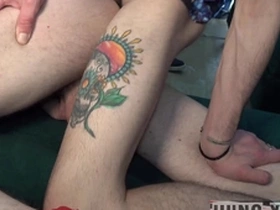 Two horny chavvy friends enjoy grabbing each other’s cocks on the sofa.