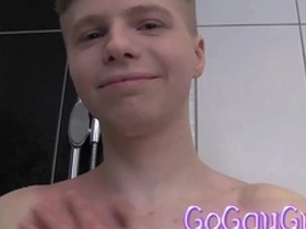 Cute soapy boy alone in a shower